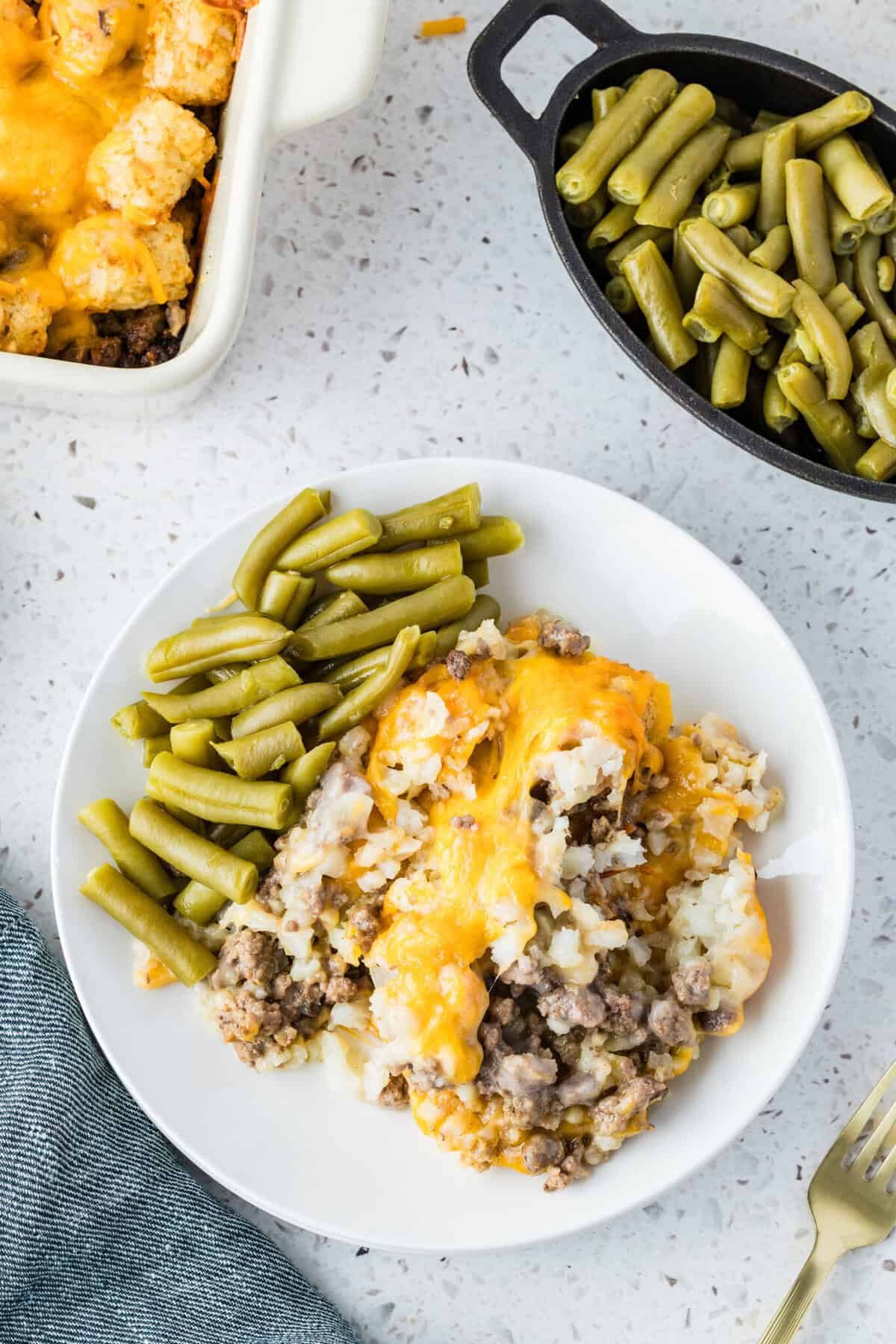 tater tot casserole 05 tater tot casserole with green beans on a plate