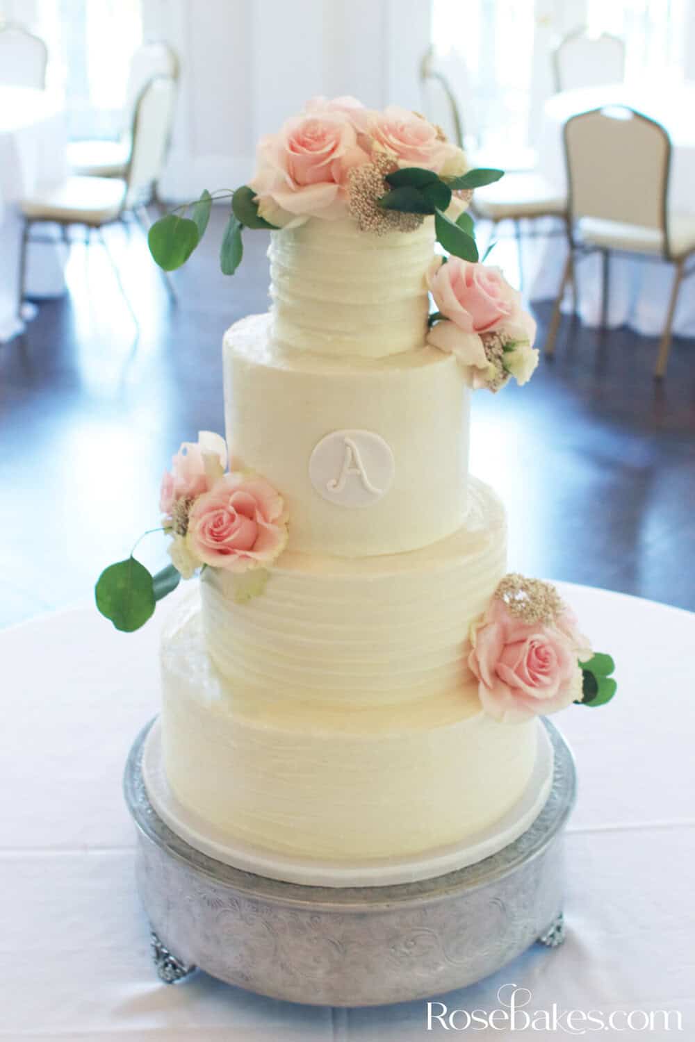 Textured-Buttercream-Lines Wedding Cake with Monogram and Pink Roses