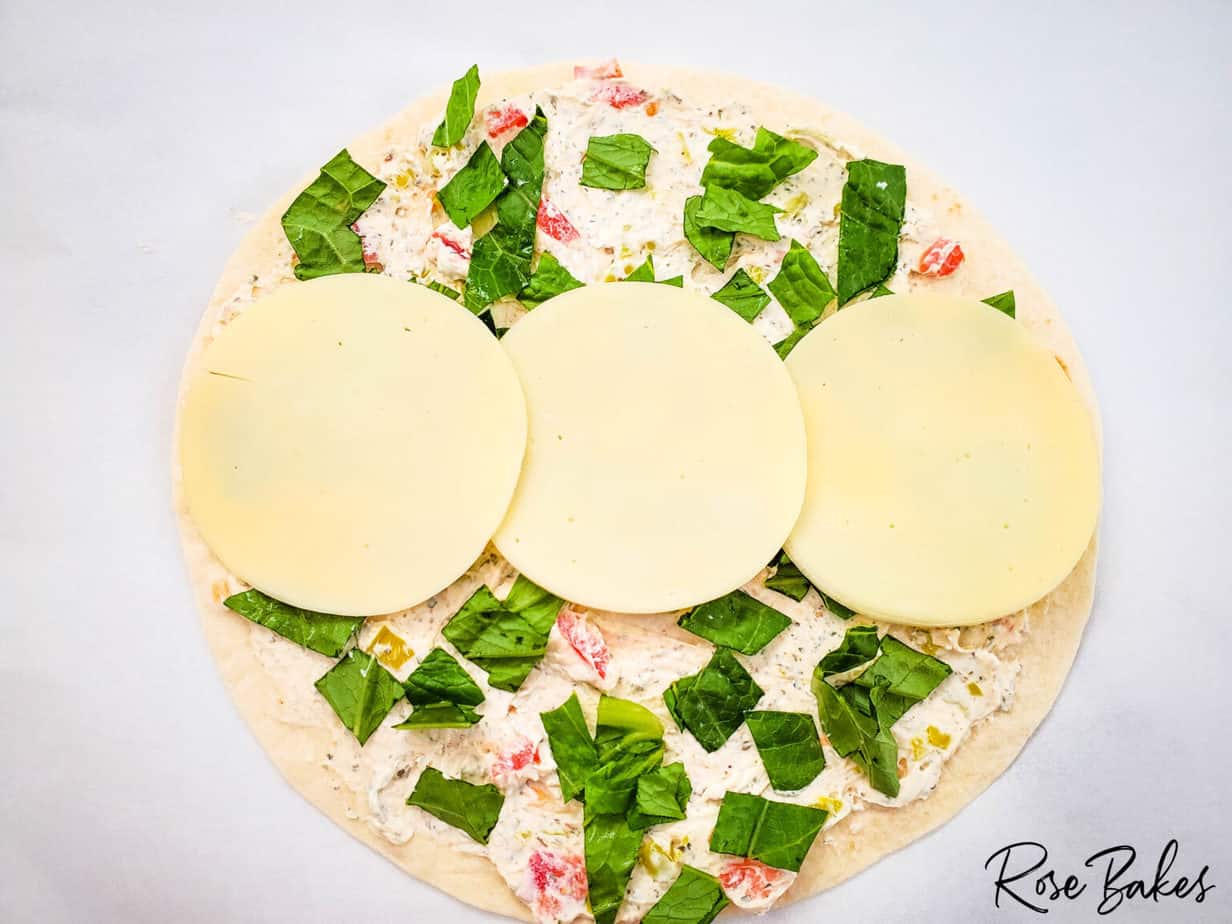 cheese in the center of the tortilla wrap