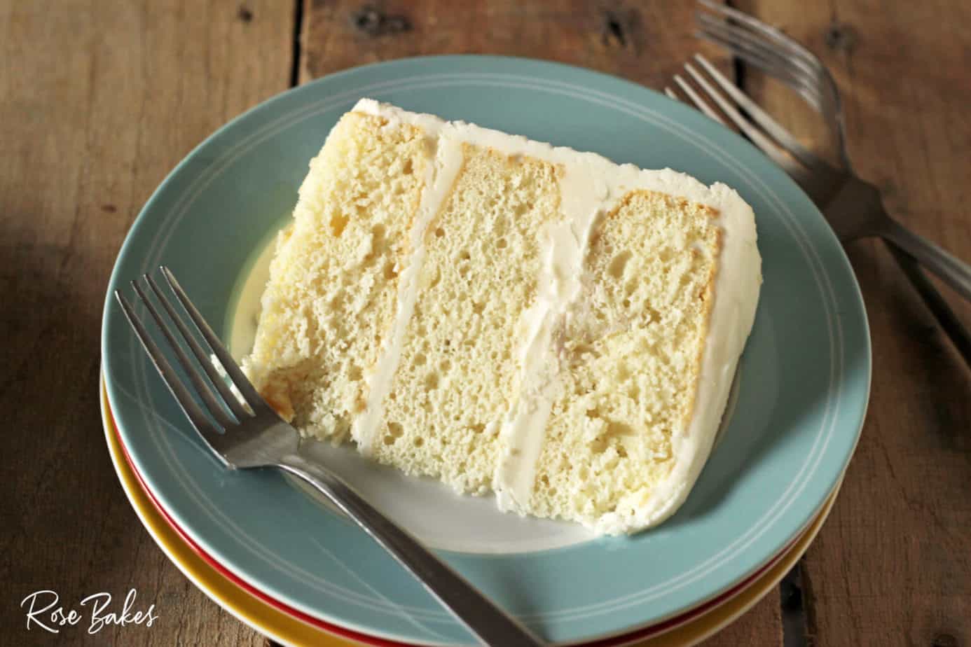 slice of doctored vanilla cake mix recipe cake