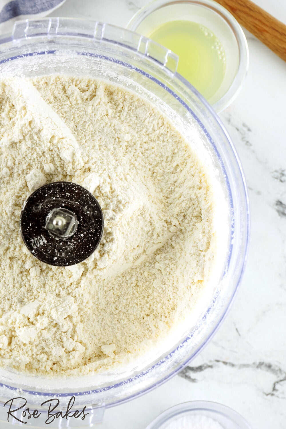 food processor with ingredients mixed in