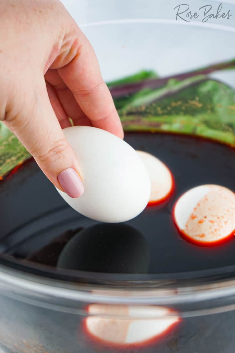 eggs being added to prepared beet juice