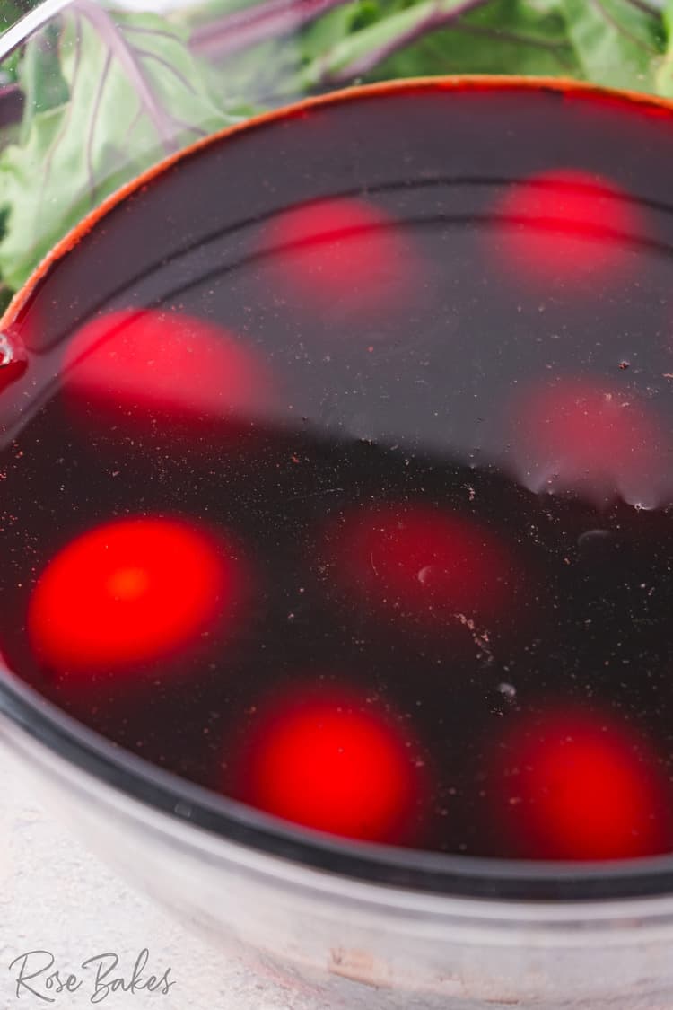 eggs sitting in beet juice for coloring 