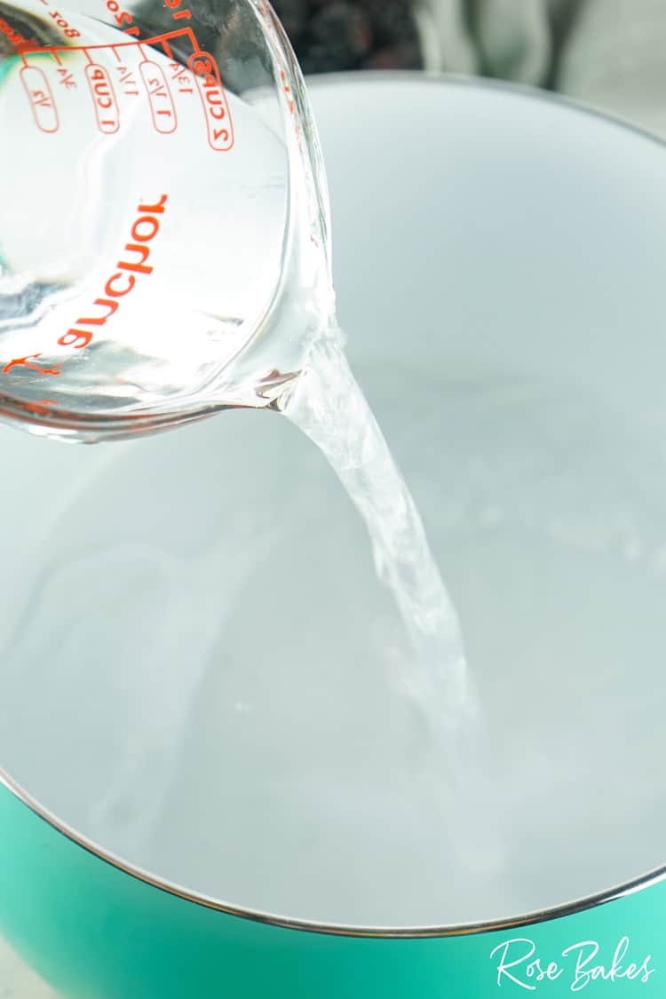 water being poured into a pot