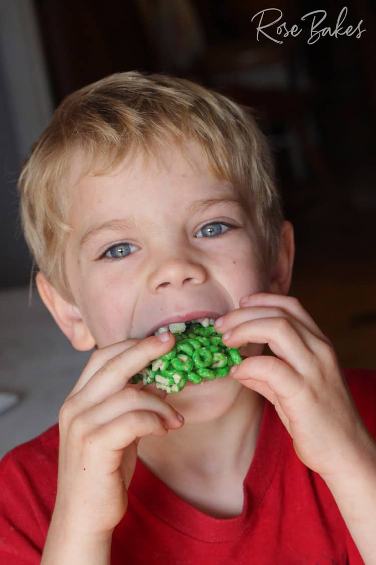 Son Christian eating Cheerios Cereal Bars for St. Patrick's Day