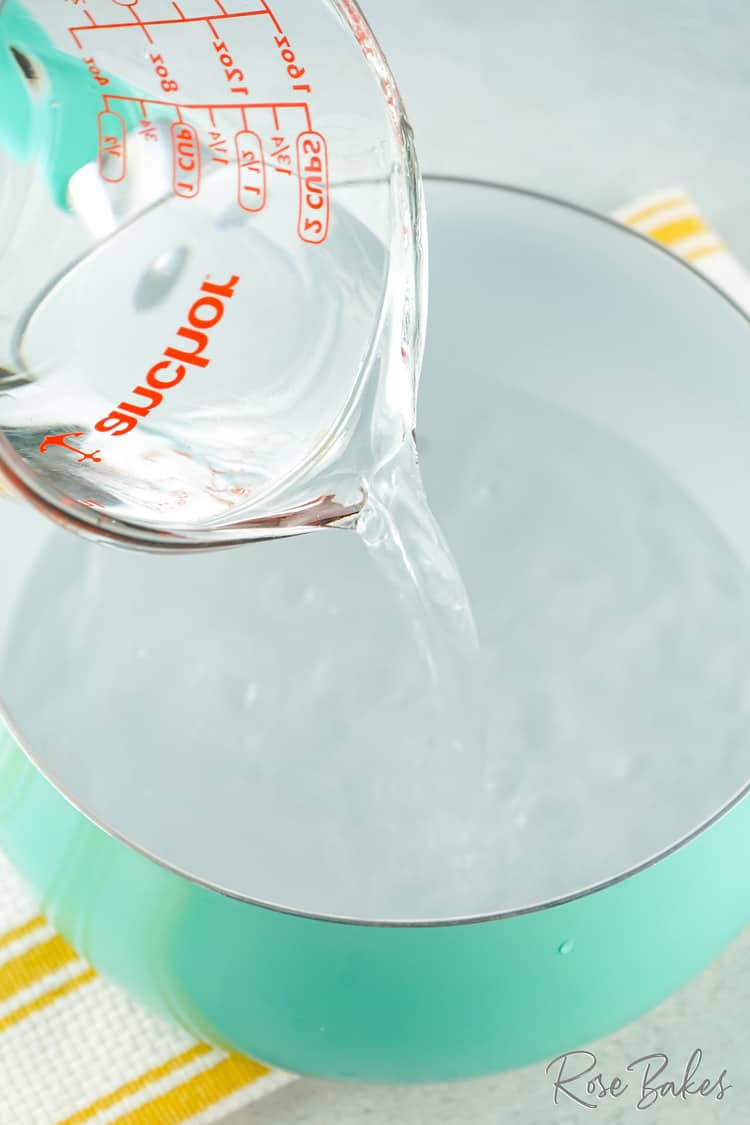 water beng poured into pot