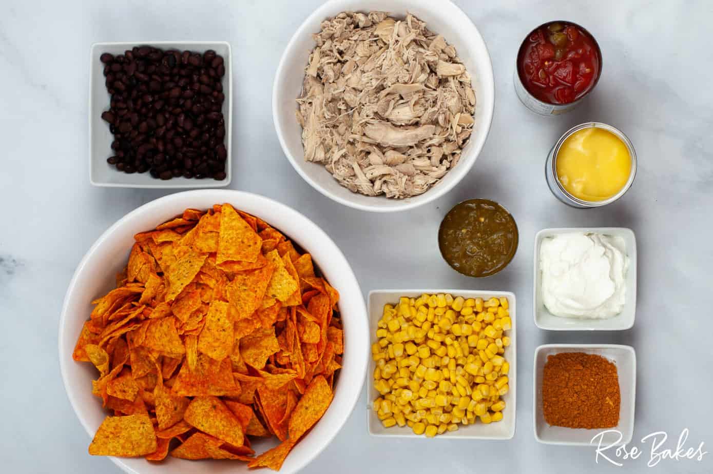 Crunchy Dorito Chicken Casserole ingredients separated out into bowls 