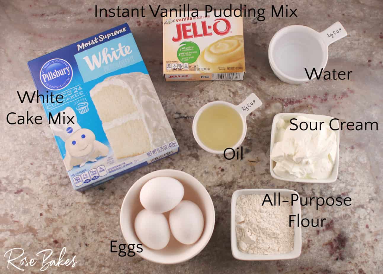 Vanilla Cake Ingredients for Drip Cake Recipe - ingredients laid on a counter top with text overlaid.