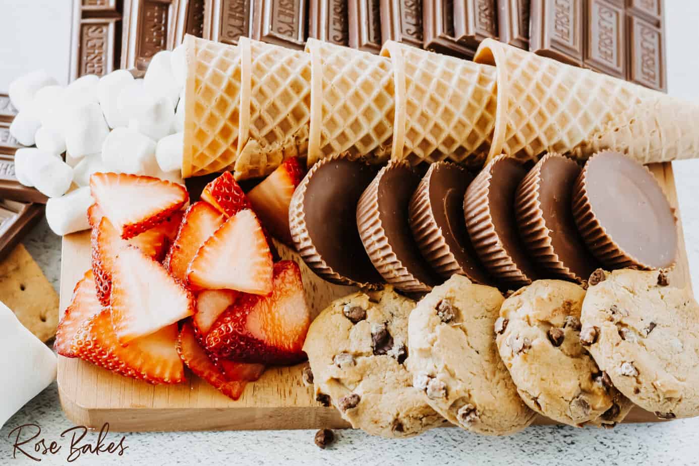 add chocolate chip cookies on the end next to the reese's cups