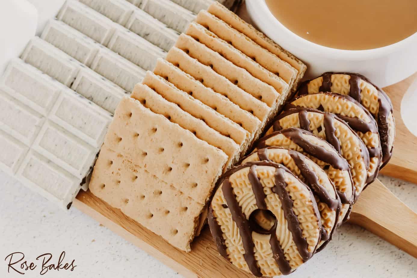 add fudge stripe cookies next to the graham crackers