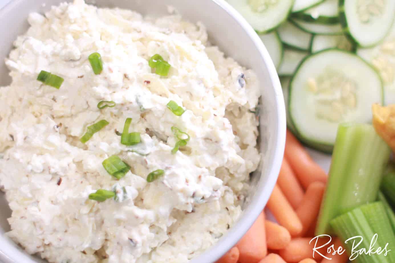 Close up of the cottage cheese dip in a white bowl.