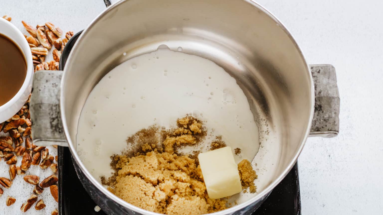 heavy cream, brown sugar, whipping cream, and butter in a sauce pan