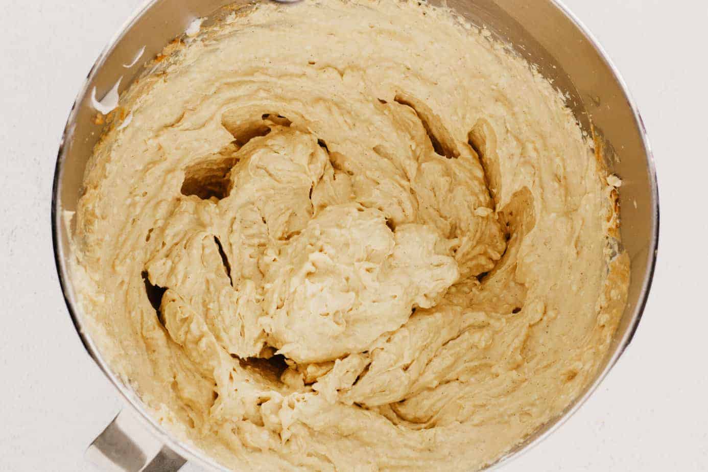 mixed up Pumpkin Cream Cheese dip in a mixer bowl