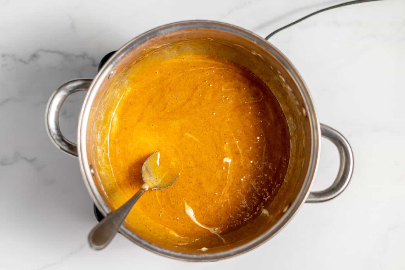 melted butter, pumpkin pie spice, pumpkin puree, vanilla, and marshmallows mixed up