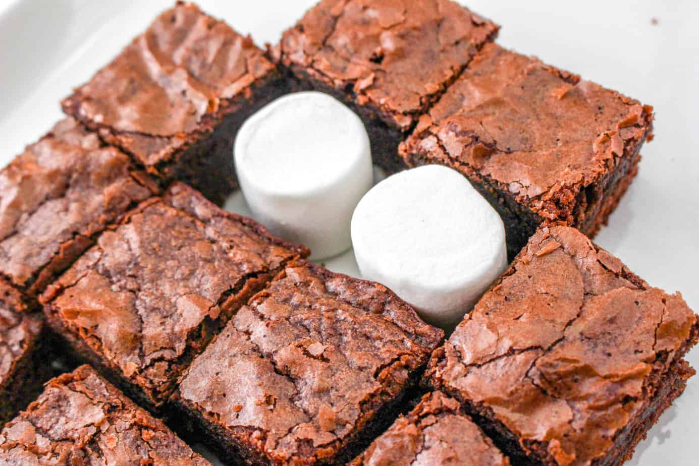 using marshmallows for eyes on holiday dessert charcuterie board