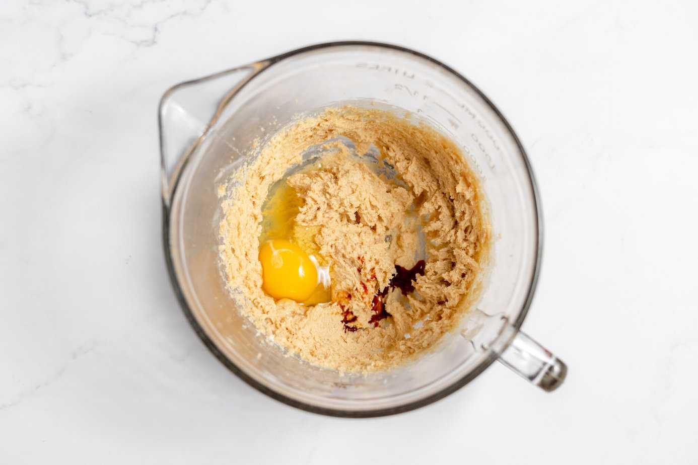 eggs creamed with butter and sugars in a mixing bowl