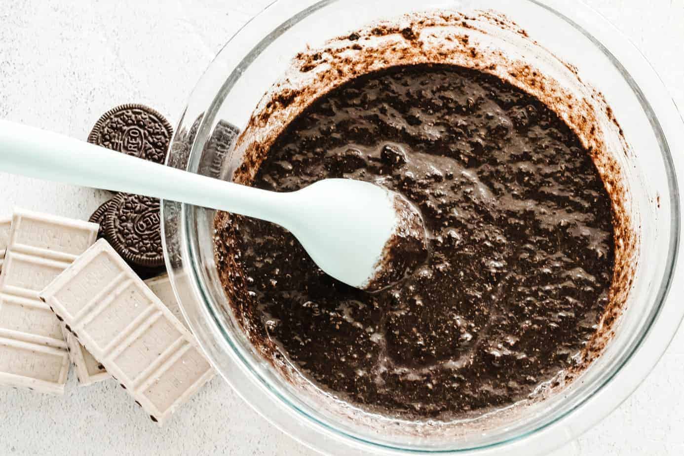 milk and baking powder added to crushed OREO cookies