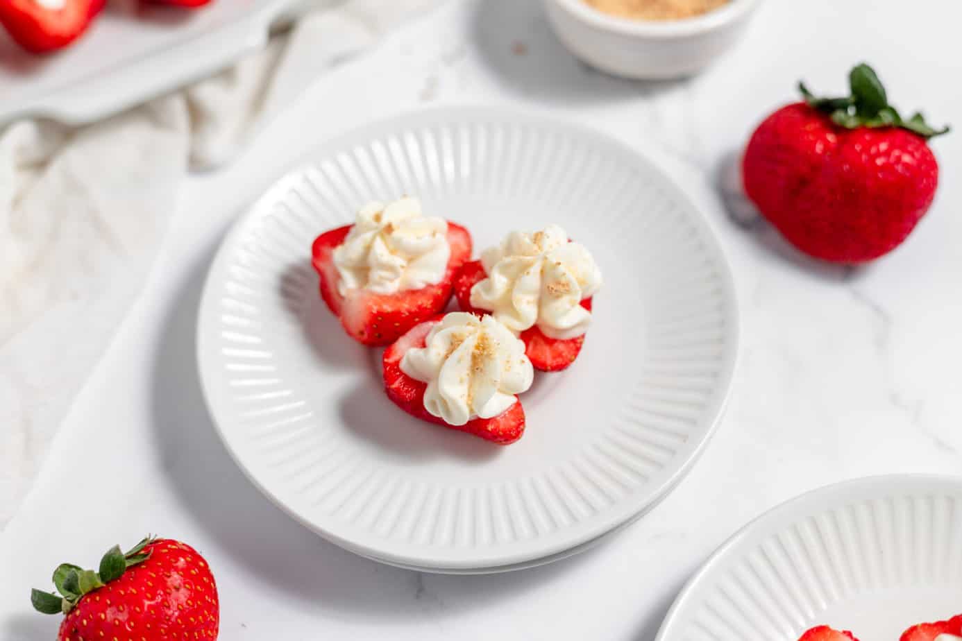 deviled strawberries on plates