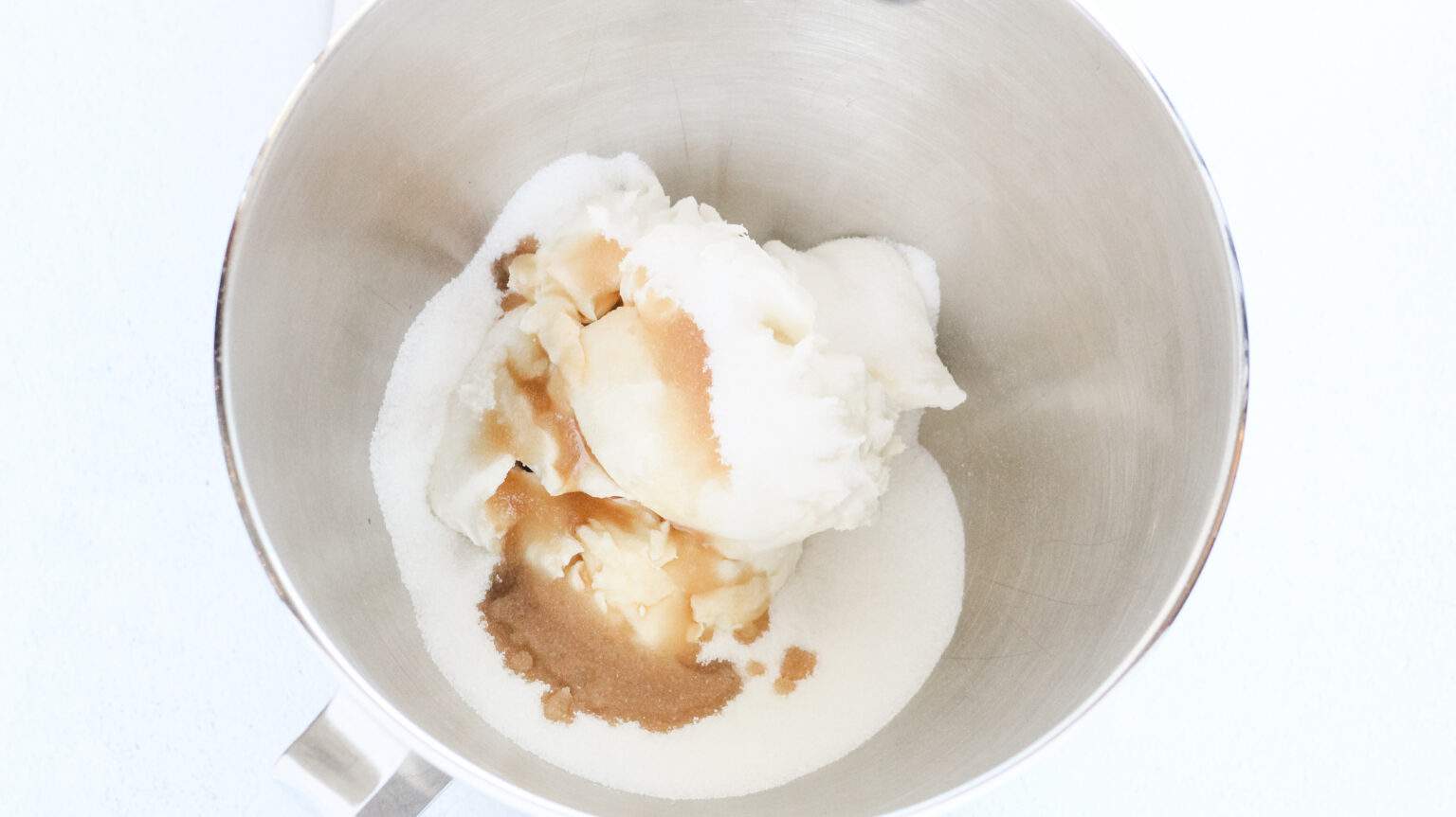 cream cheese, vanilla and sugar in a bowl