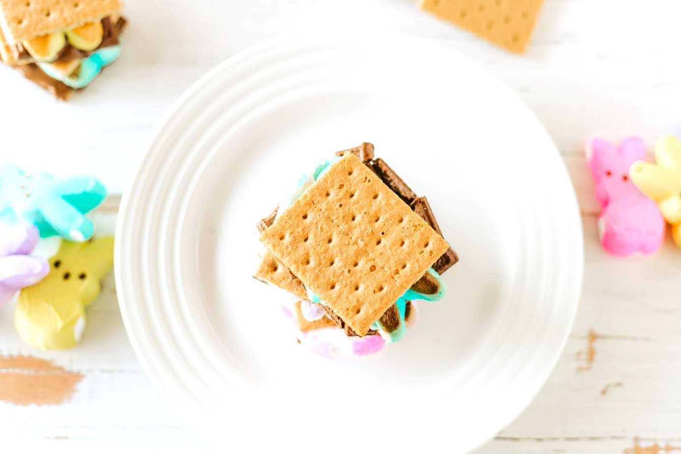 smores made with peeps on a white plate 