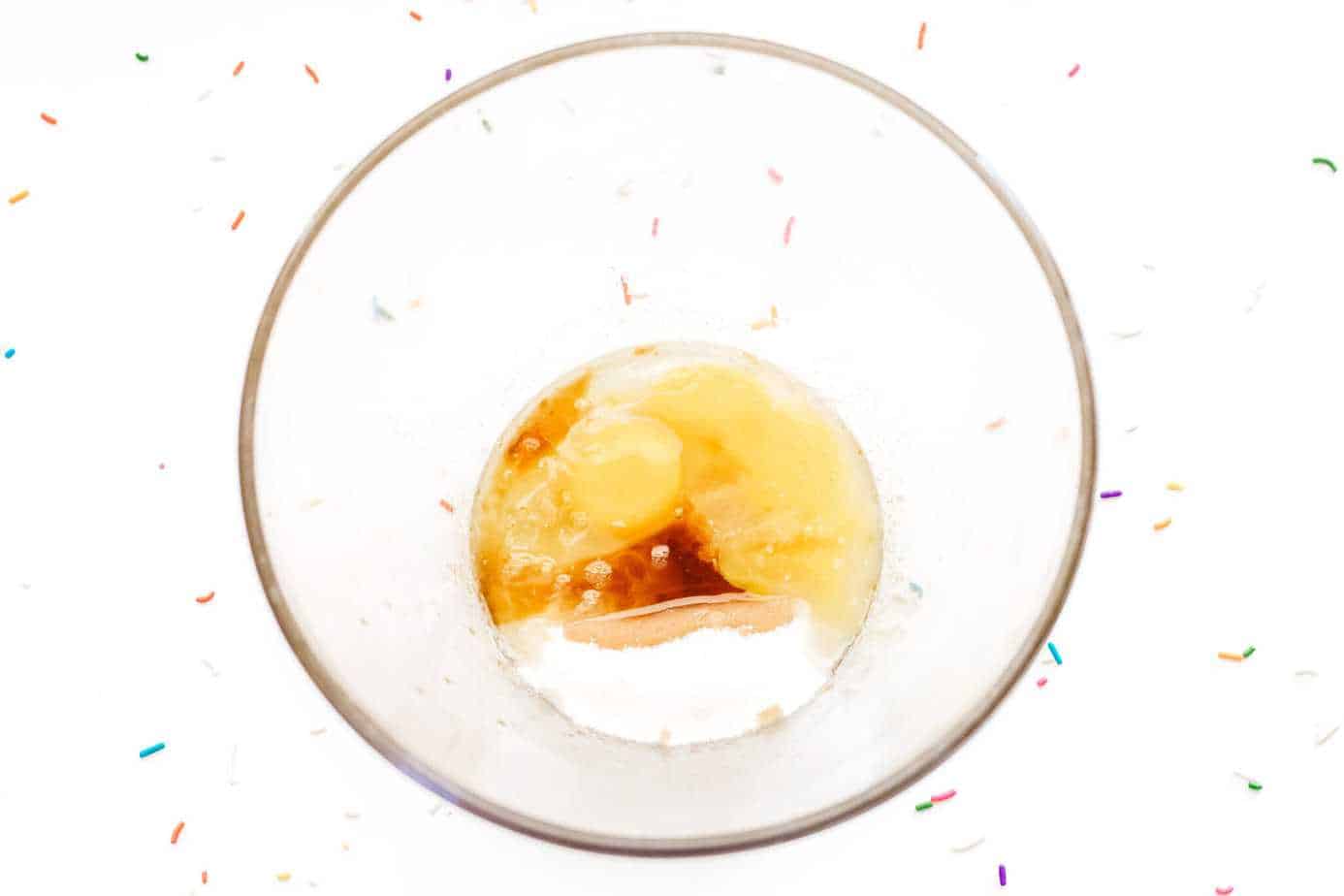 wet ingredients in clear glass bowl