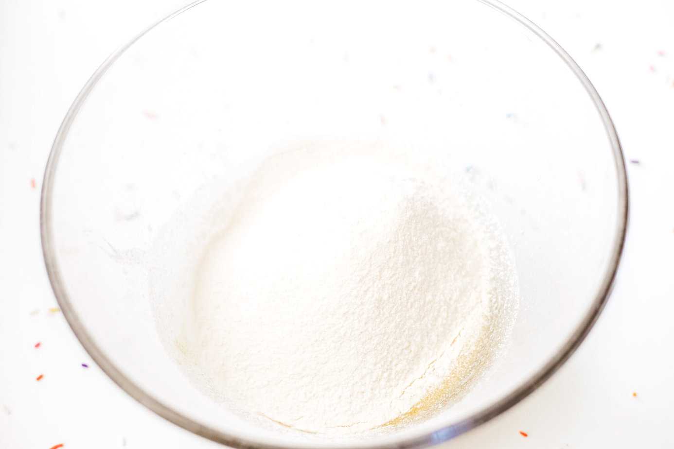 dry ingredients sifted into clear glass bowl
