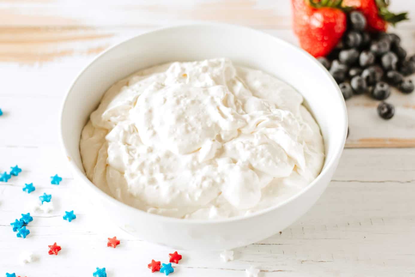 cream cheese, pudding mix, creamer, cool whip, and vanilla extract in bowl mixed up