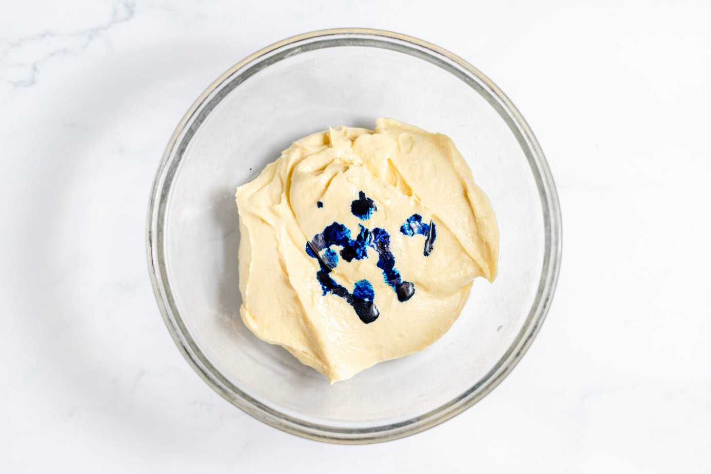blue food coloring added to white cake batter