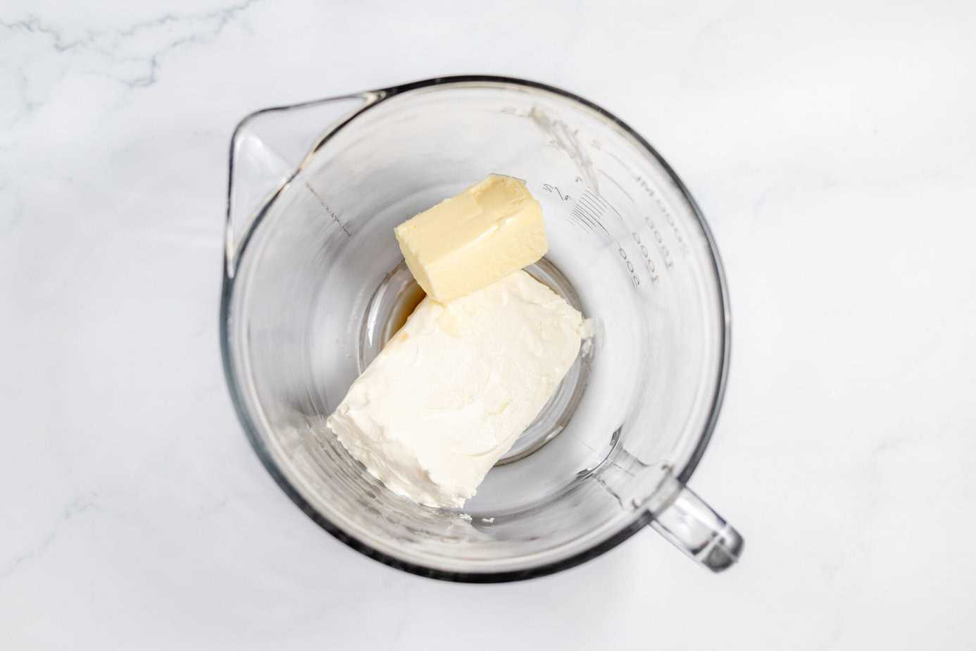 cream cheese and butter in mixing bowl
