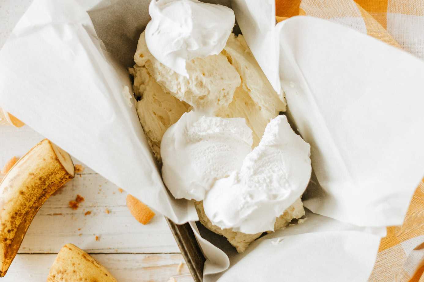 whipped cream mixture spread in loaf pan topped with cool whip
