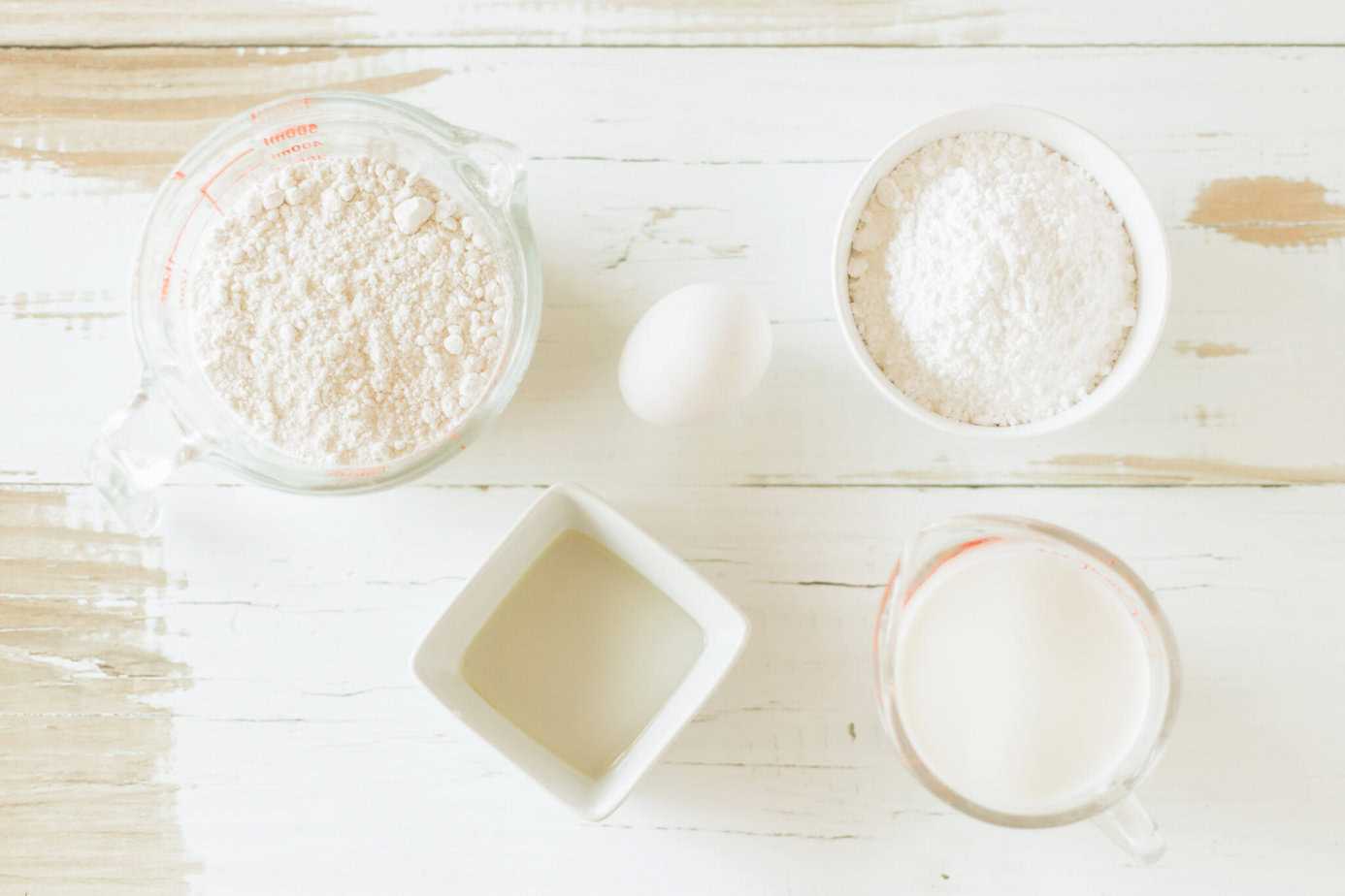 funnel cake ingredients on whit surface