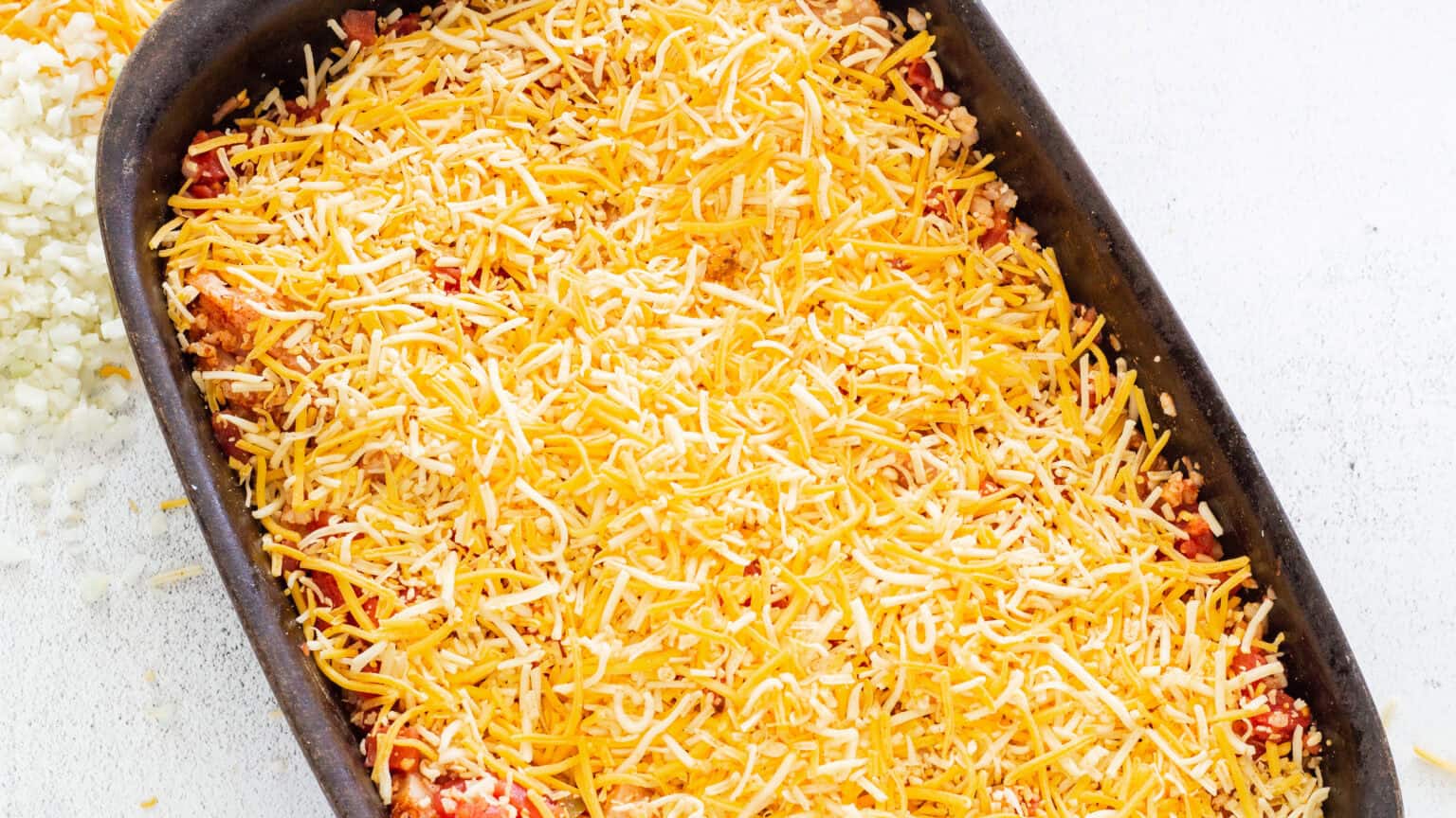 shredded cheese added on top.