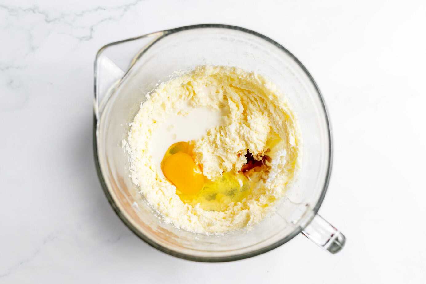 eggs and vanilla added to whipped butter and sugar