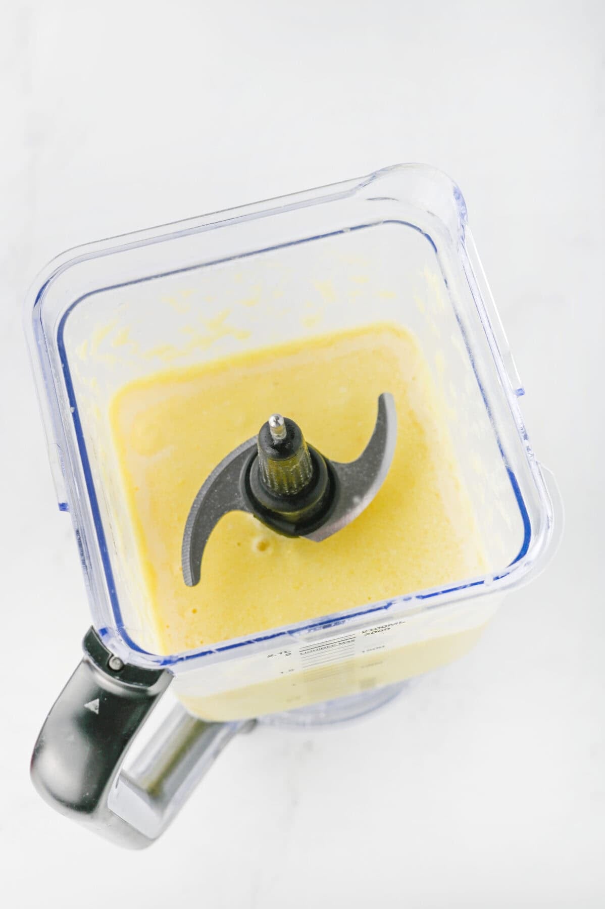 blended ingredients for pina colada popsicles