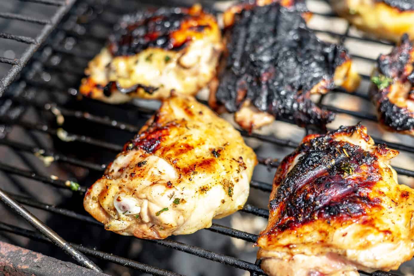 grilled chicken thighs on a grill