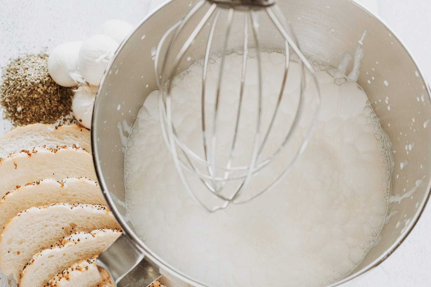 whipping heavy cream in a mixer bowl
