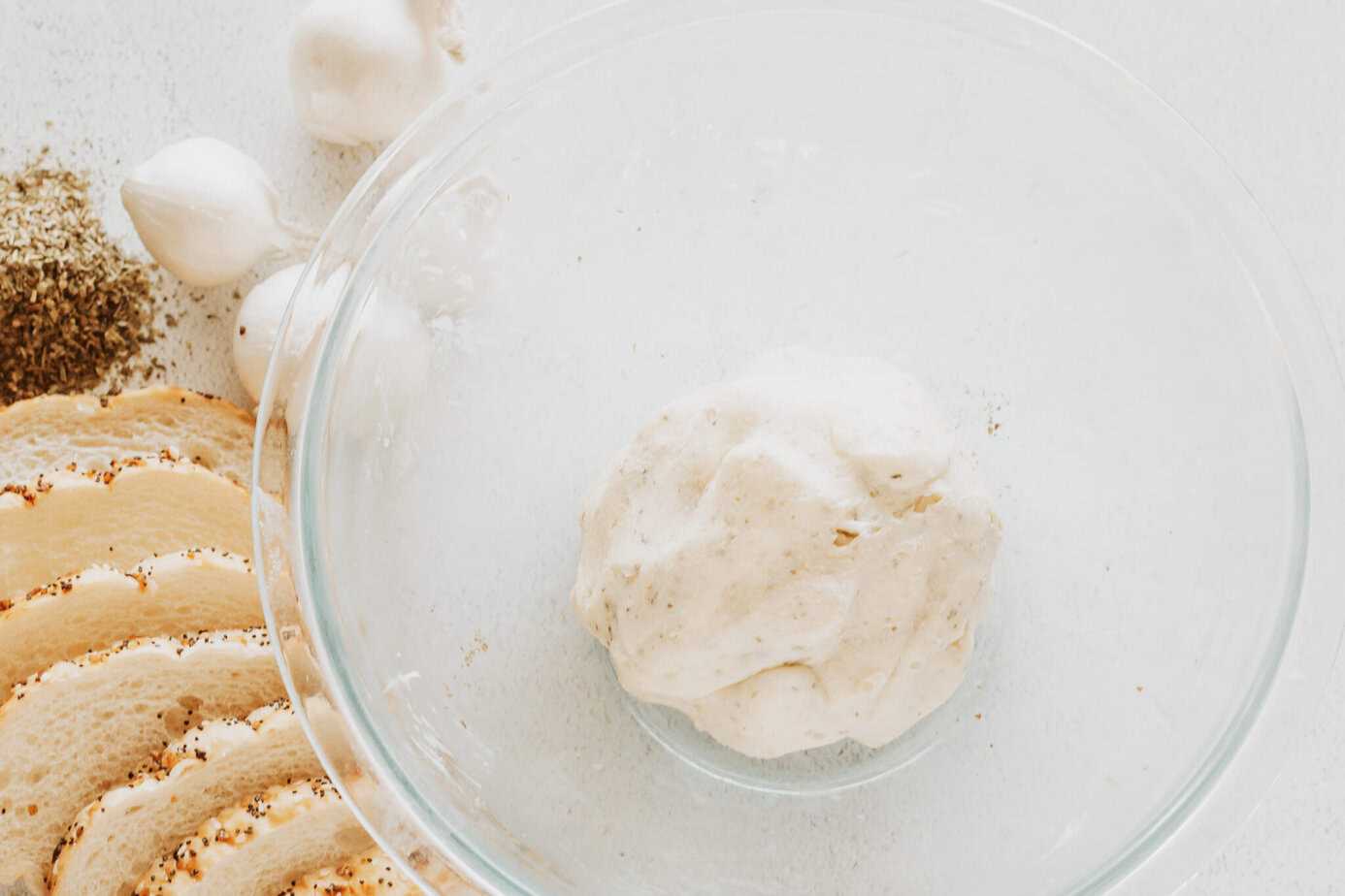 fresh garlic and herbs butter in a bowl kneaded into a ball