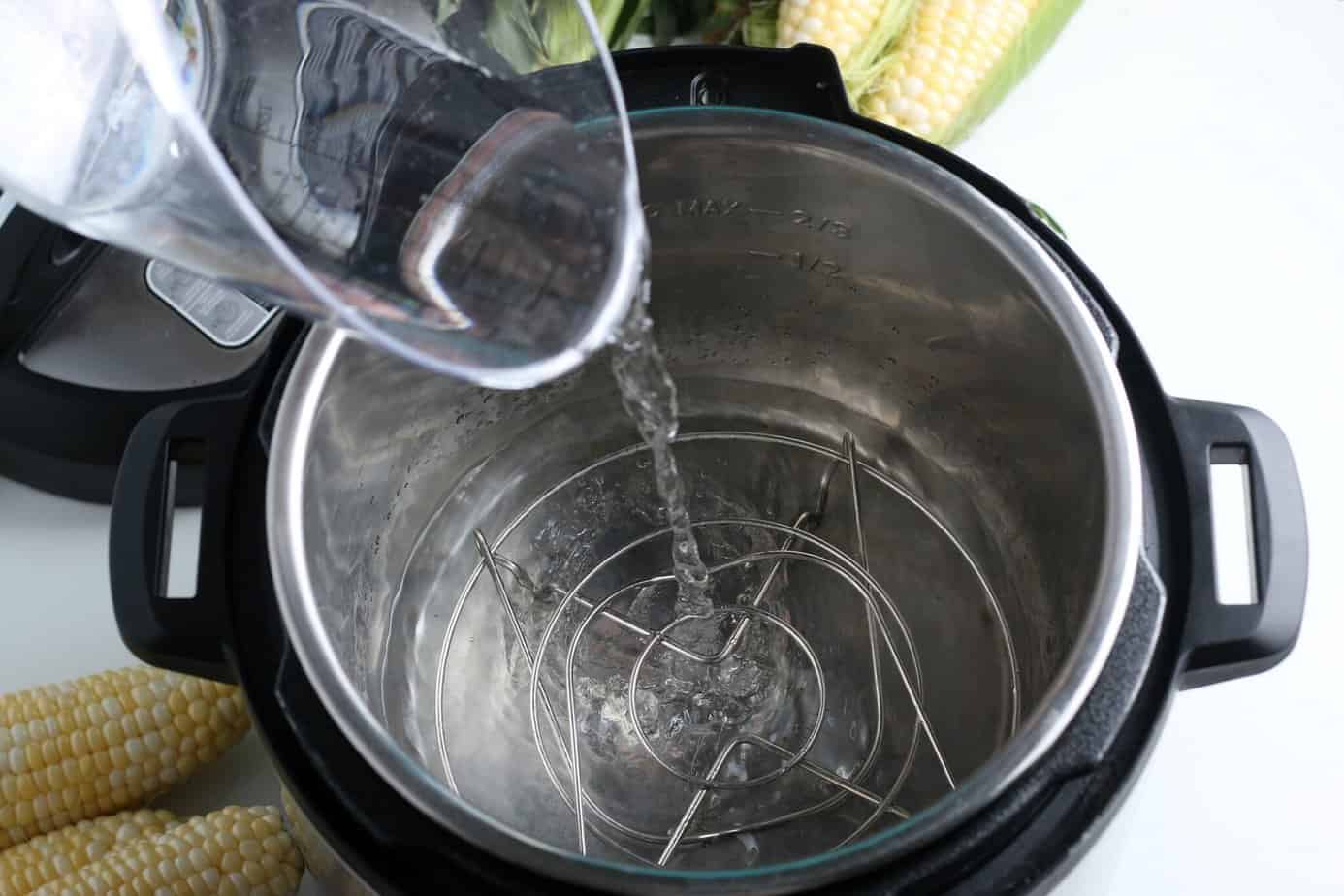 Pouring water into the Instant Pot
