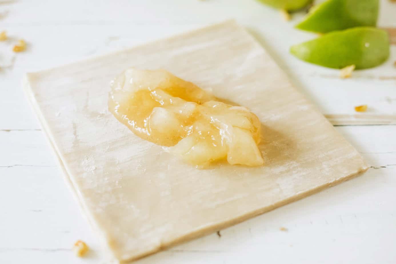 apple pie filling on an egg roll wrap