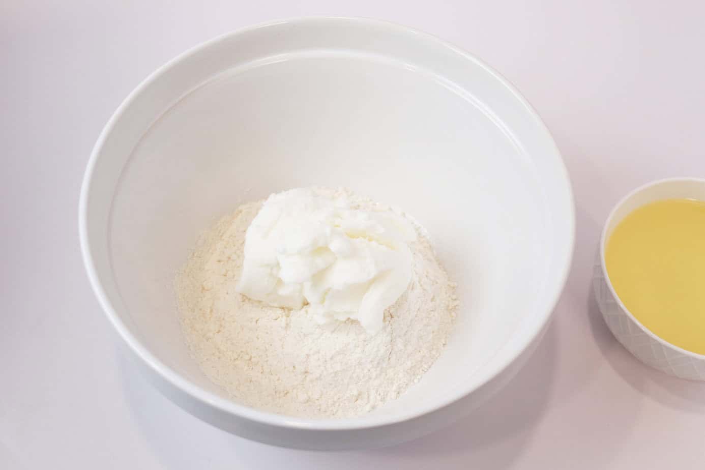 flour and shortening in a white mixing bowl