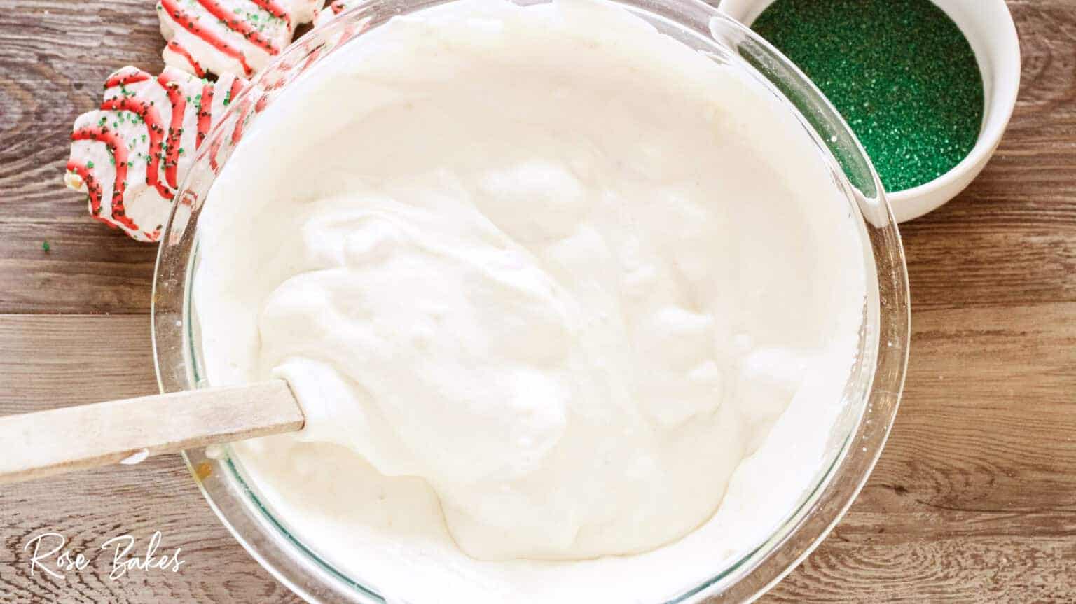 Little Debbie Christmas Tree Cakes Ice Cream ingredients mixed up in bowl