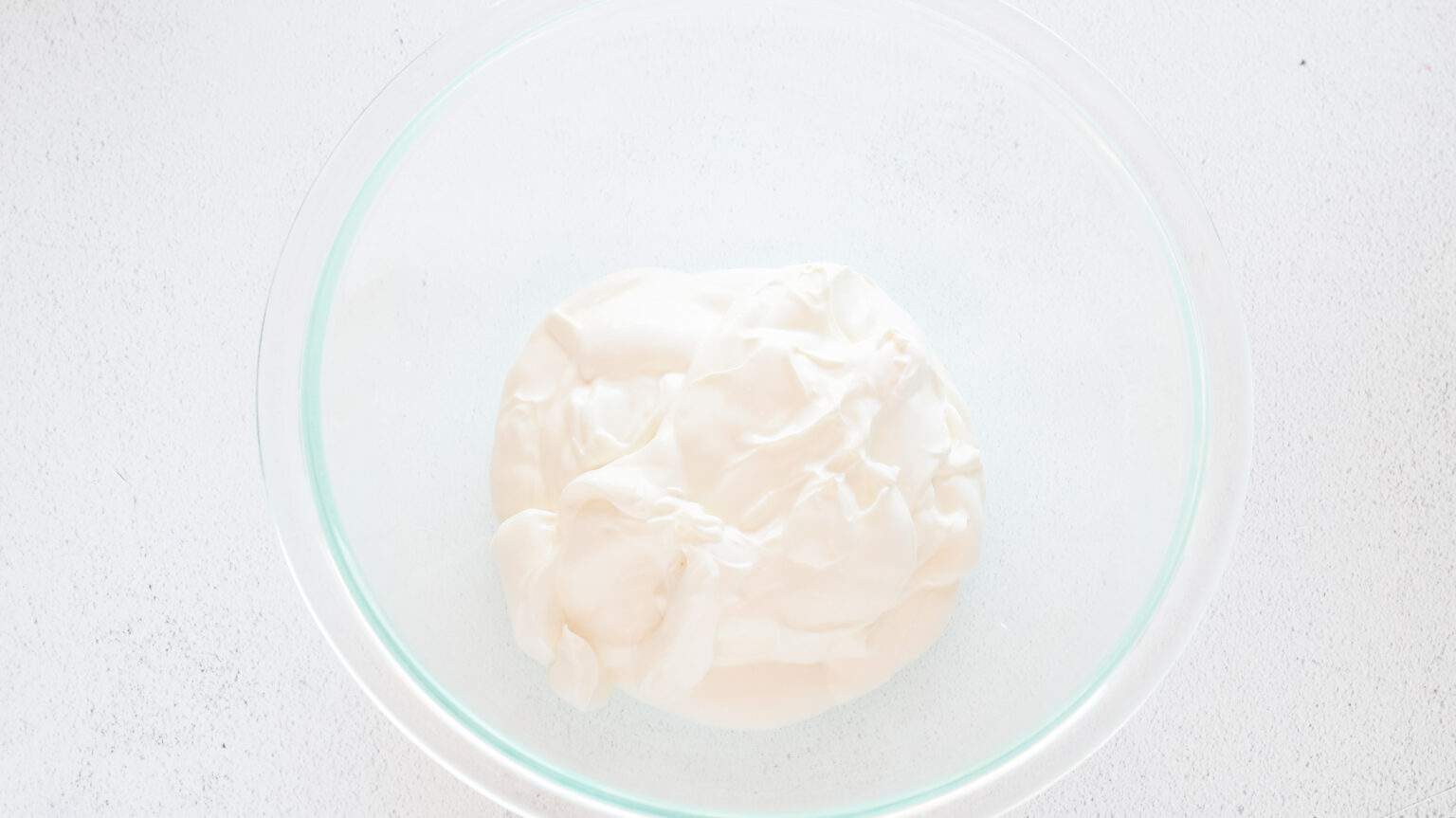 sour cream in a clear bowl