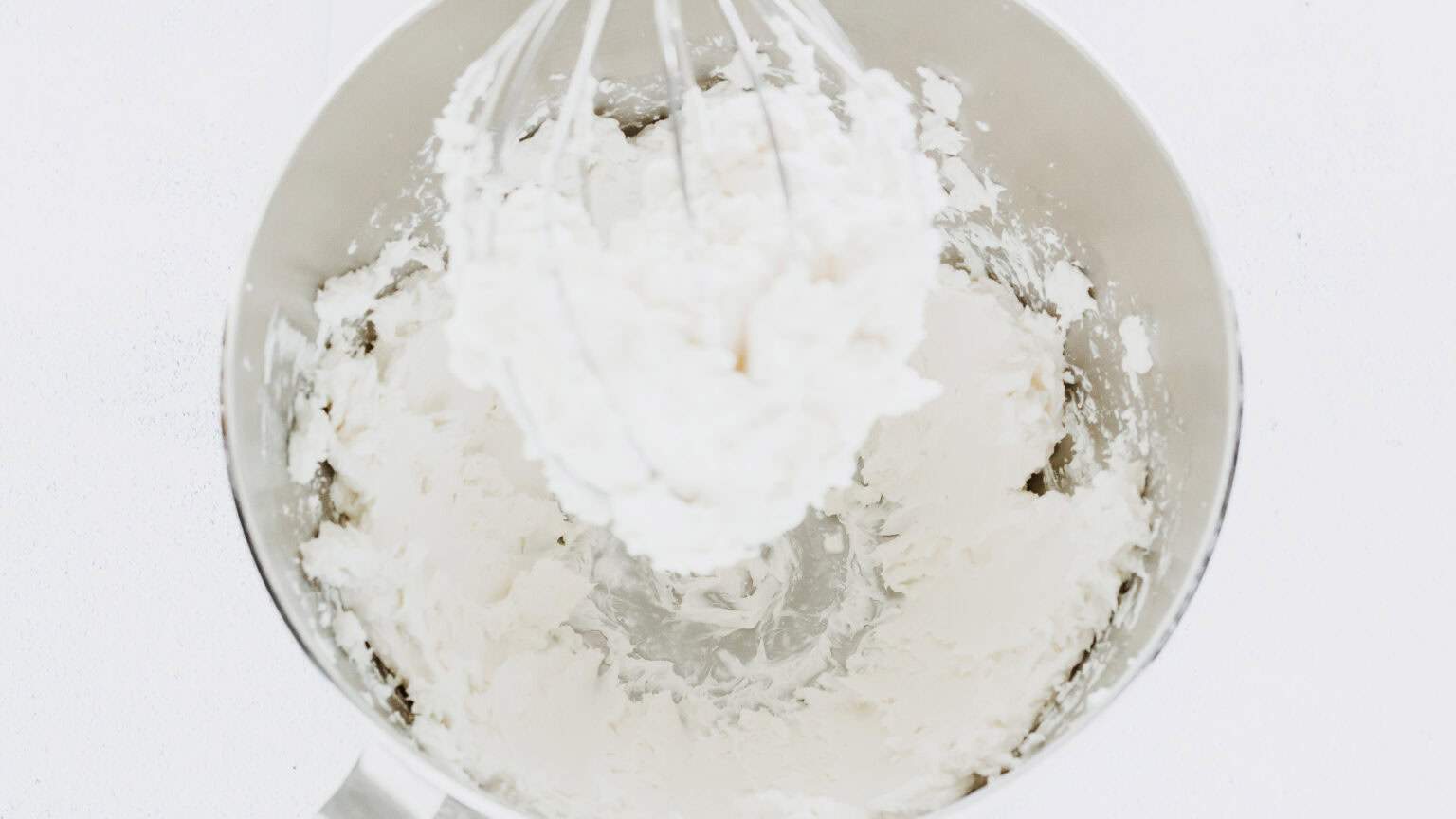 whipped cream cheese in mixing bowl