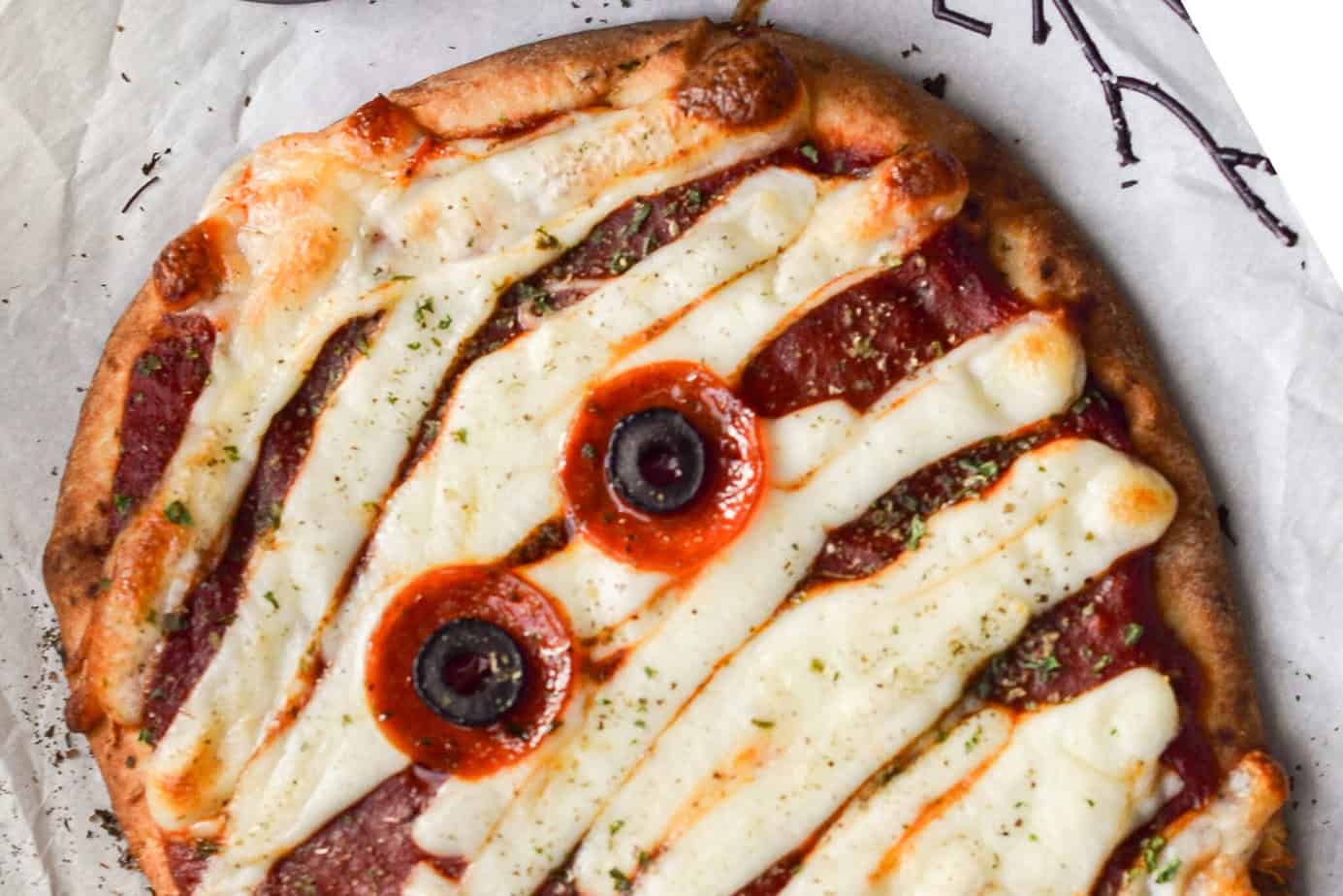 halloween pizza with mummy eyes