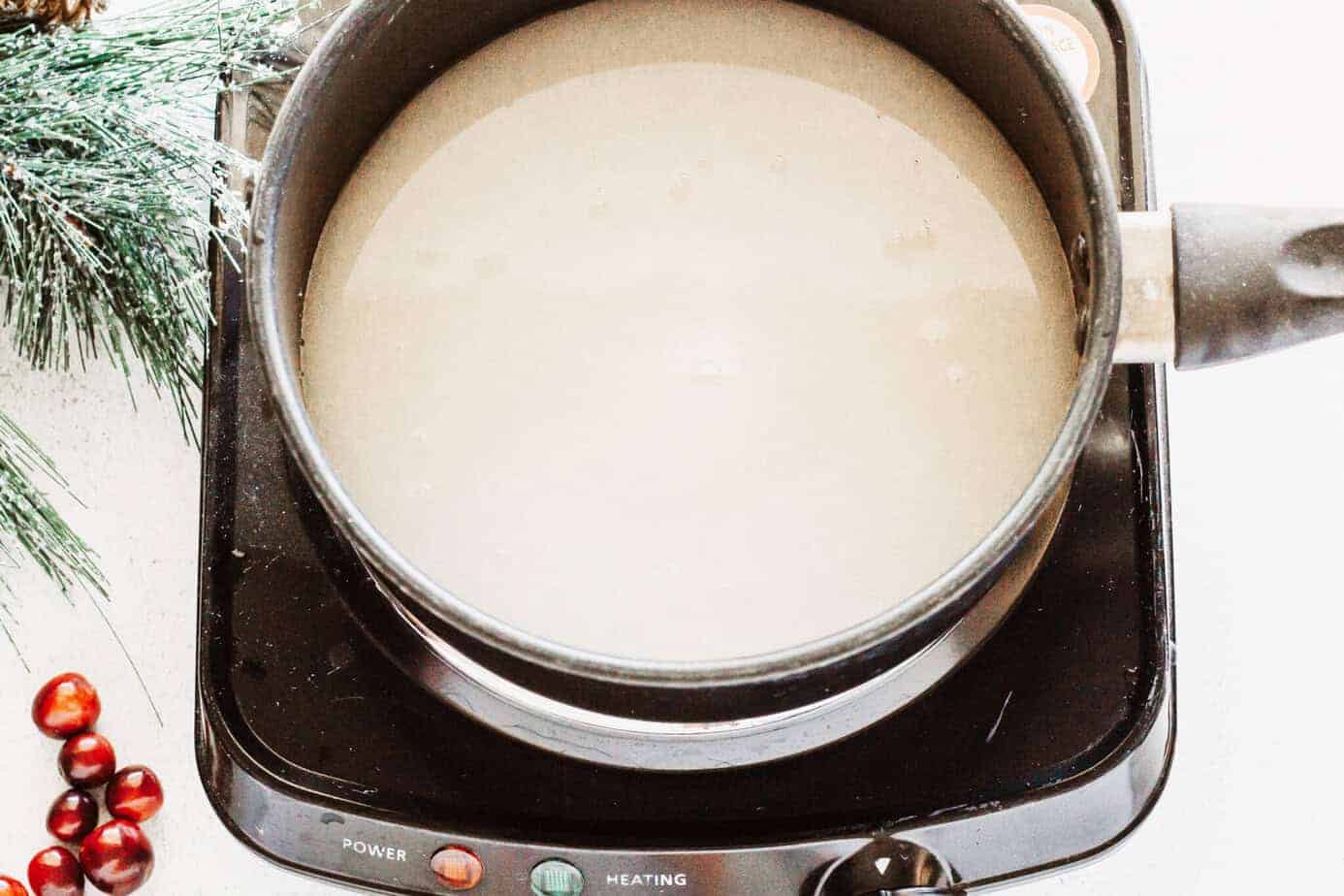 sugar and water in pot to boil