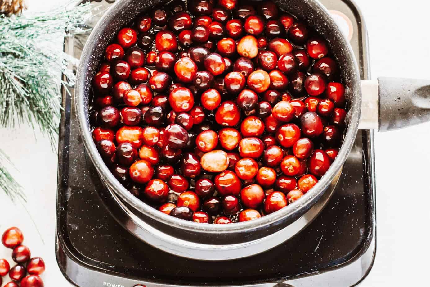 cranberries added to sugar syrup