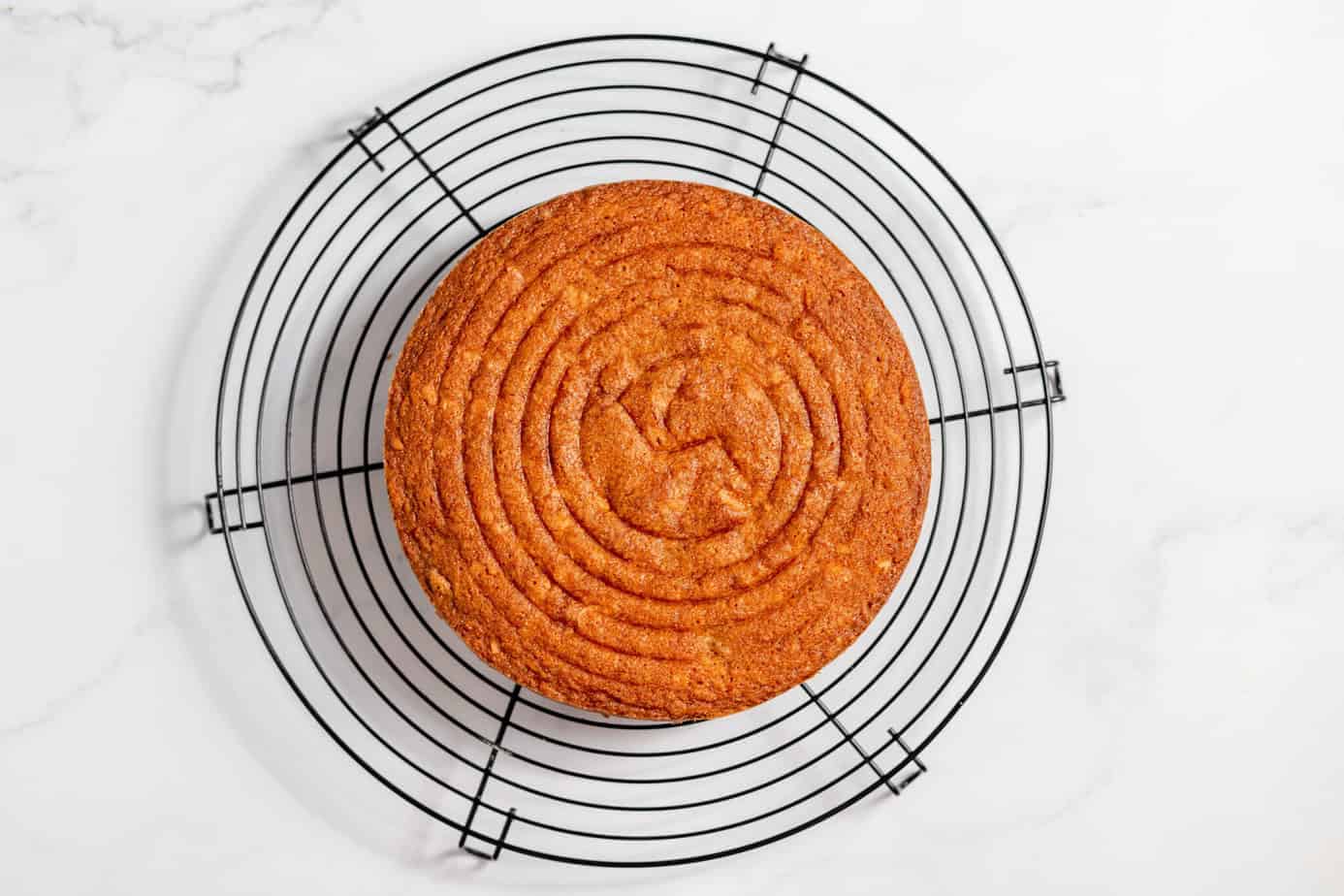 baked cake layer on coolig rack
