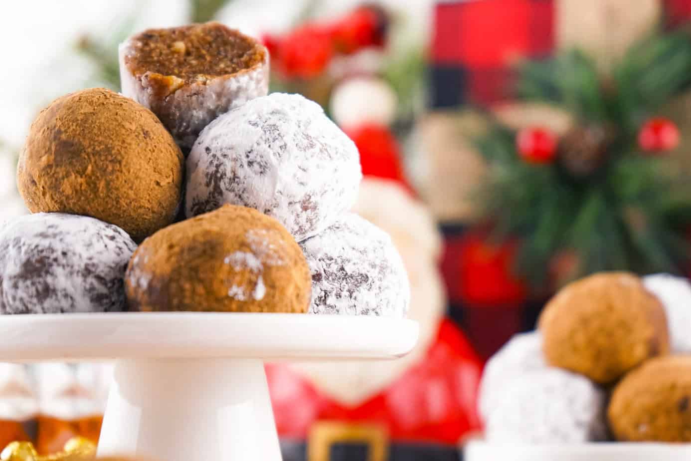whiskey balls on a small white pedestal