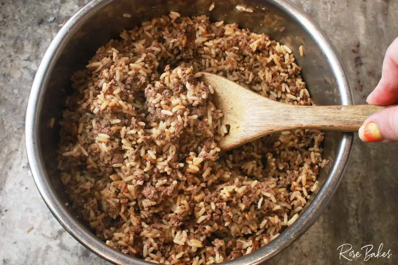 zatarain's dirty rice in instant pot with wooden spoon
