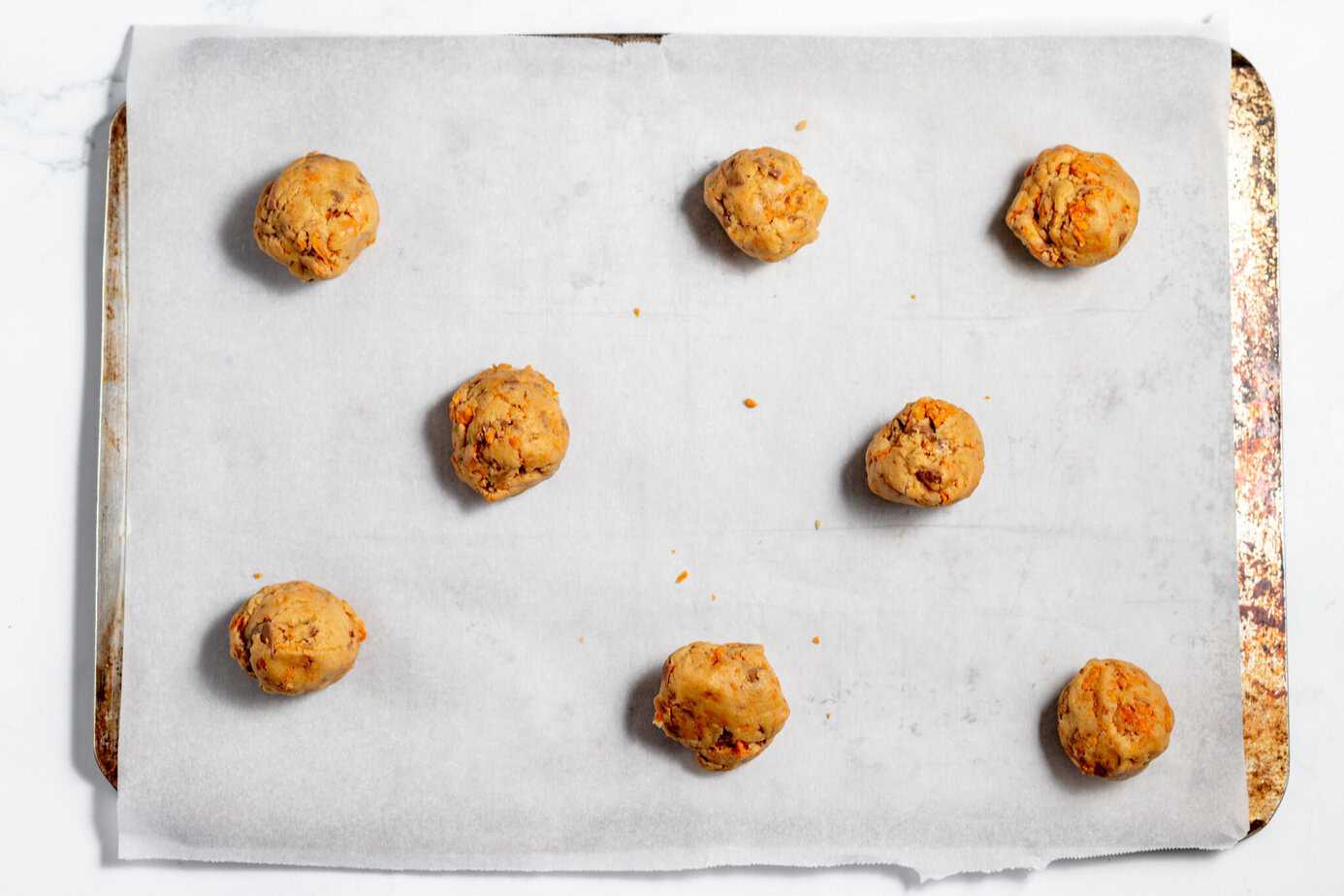 butterfinger balls on a cookie sheet